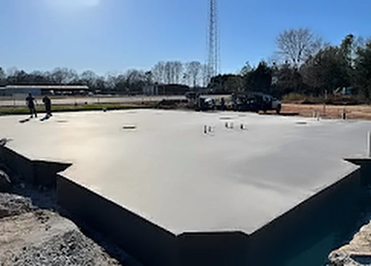 A large finished commercial concrete slab with a formed edge